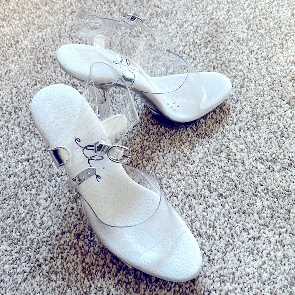 NEVER WORN. Size 5. Clear Heels.